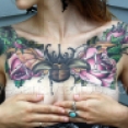 Beetle and Roses femininechest tattoo,new orleans tattoo, randy muller, eyecandy, icandytattoo, i candy, eye candy,